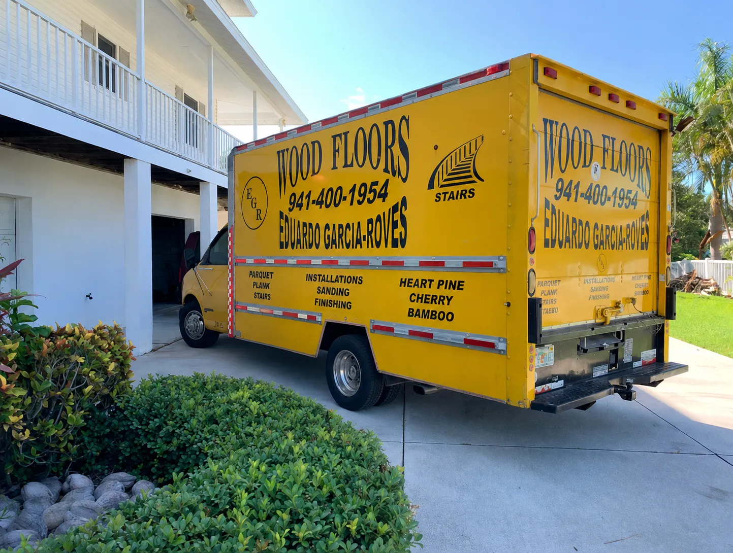 The EGR Wood Floors truck parked at a Sarasota home