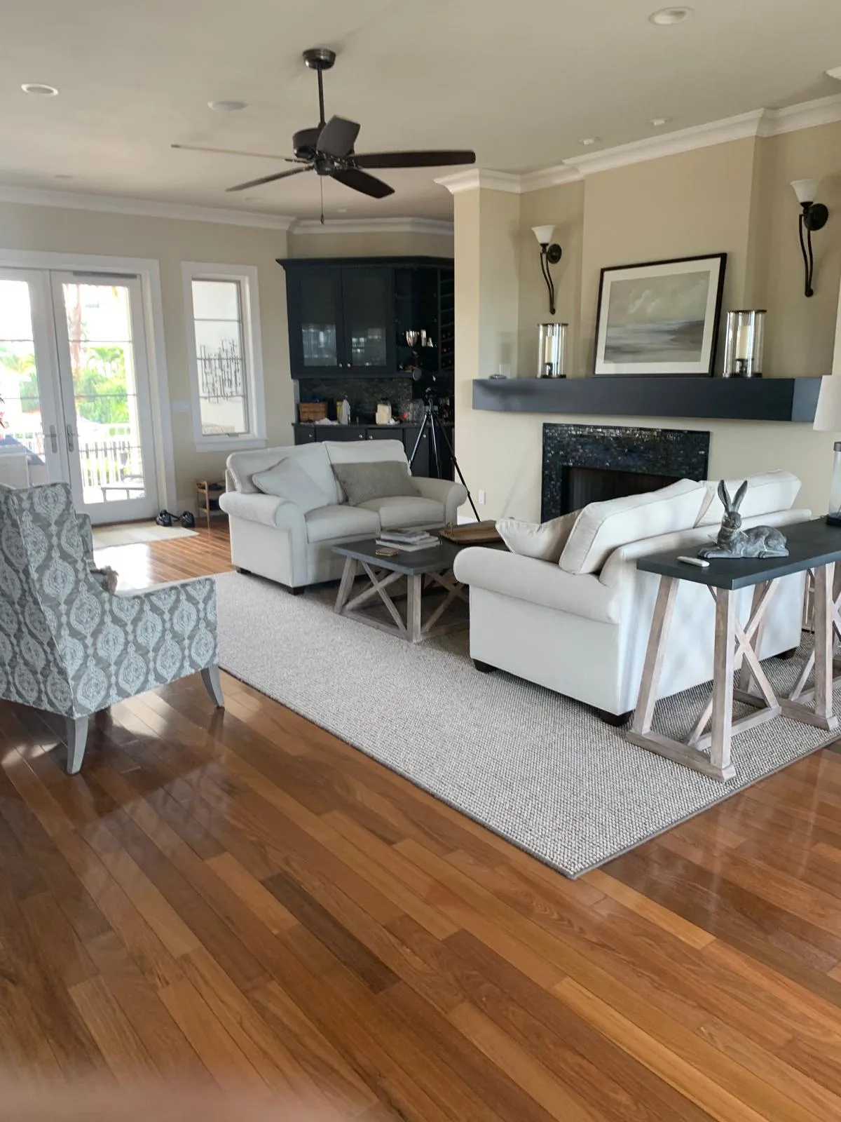 Warm hardwood floor installed in an elegant Sarasota living room